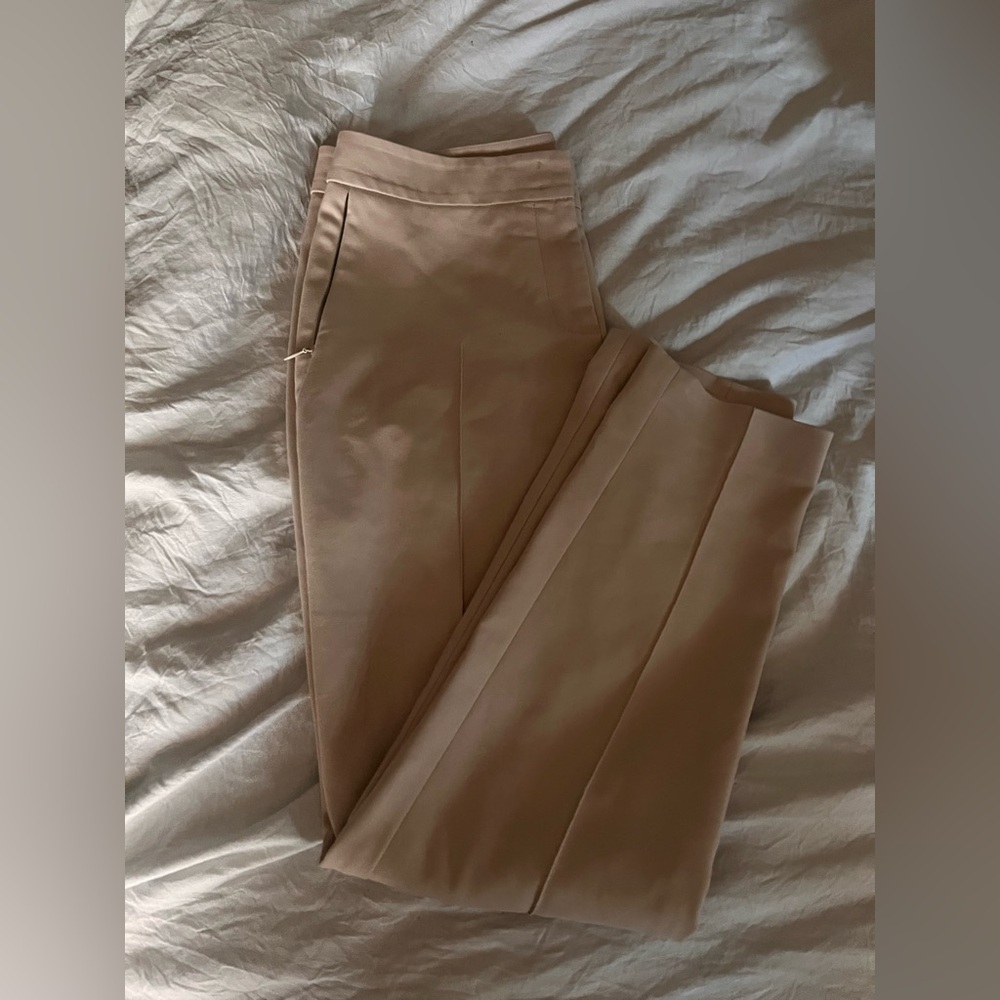 Arkis Punto tan capri pants with zippered pockets. Light tan size 4